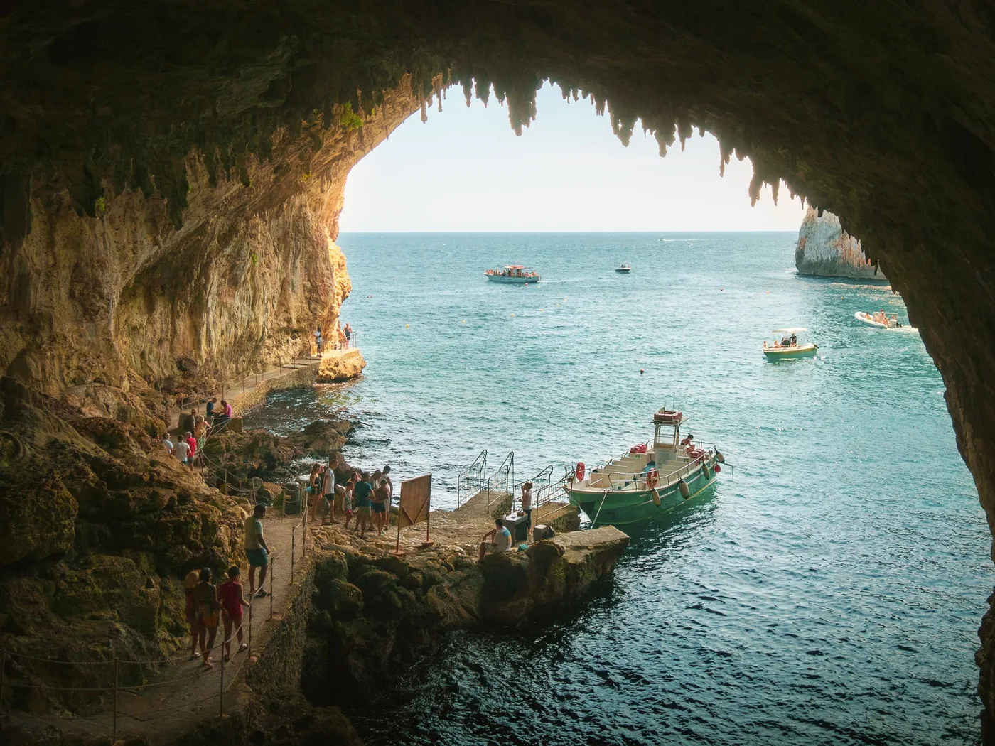 The glowing blue water inside the Blue Grotto sea cave